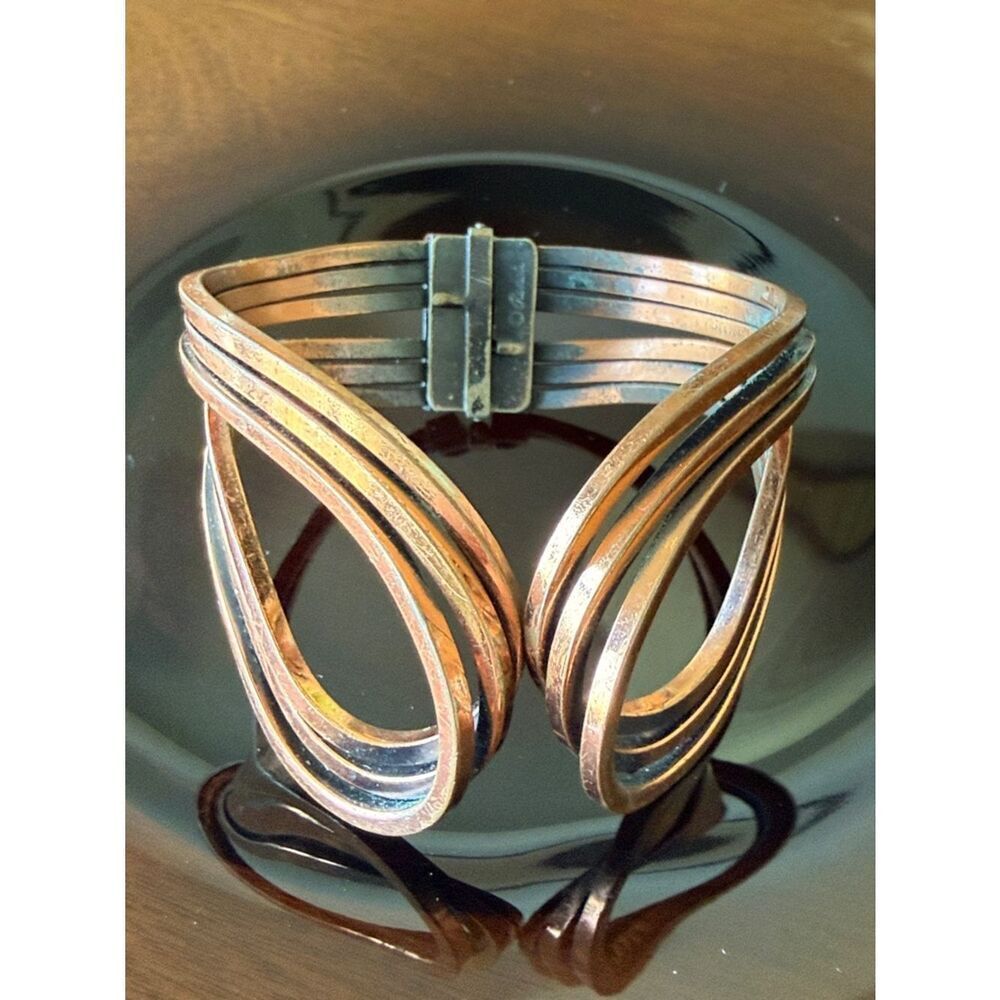 Vintage 1950’s Renoir Rhythm copper wire hinged cuff
